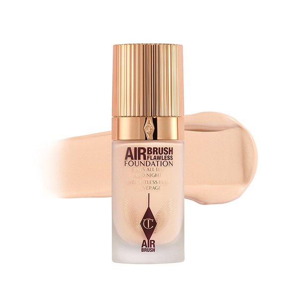 Full Coverage Foundation rose gold cap with cream texture swatch behind