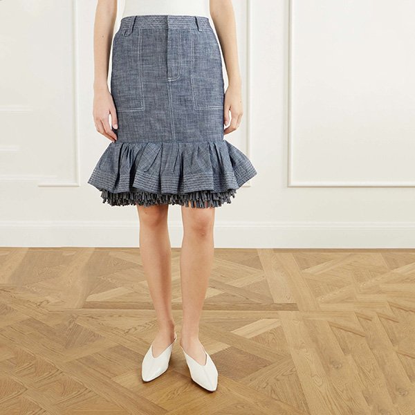 Denim Skirt Jacquemus La Jupe Cabana grey front view with ruffled fringe hem and contrast stitching