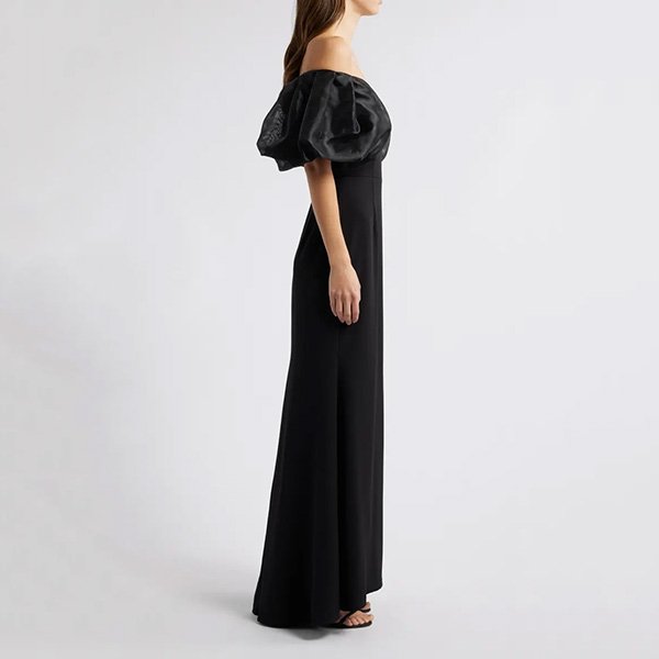 Evening Gown Eliza J black side profile showing puff sleeve volume and floor-length mermaid hem