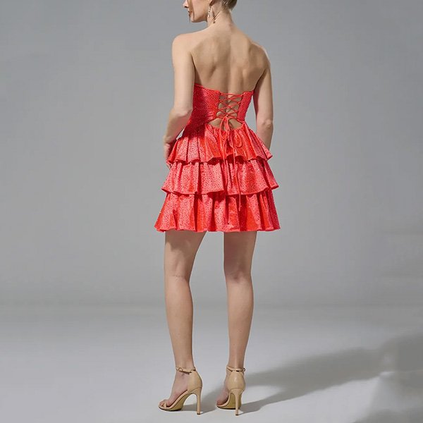 Party Dress AW Irene tangerine back view with corset lace-up and tiered ruffle skirt