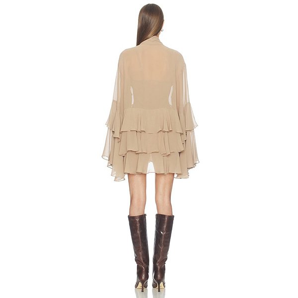 Ruffled Dress Camila Coelho Taja Taupe rear view showing tiered flounces and cape sleeves with brown boots