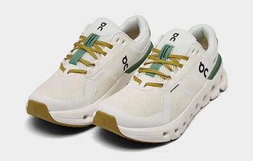Running Shoes On Running Cloudrunner 2 Undyed Green angled pair view with green heel stripe